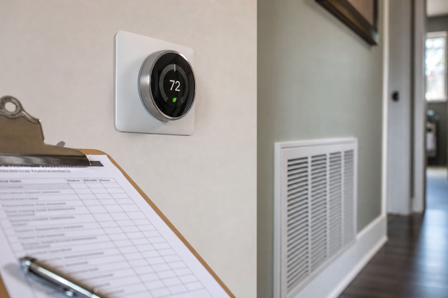 Thermostat and nearby vent used to troubleshoot weak airflow