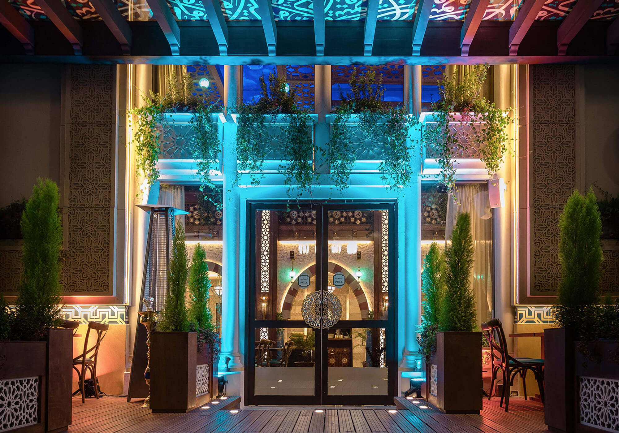 The illuminated entrance after dark