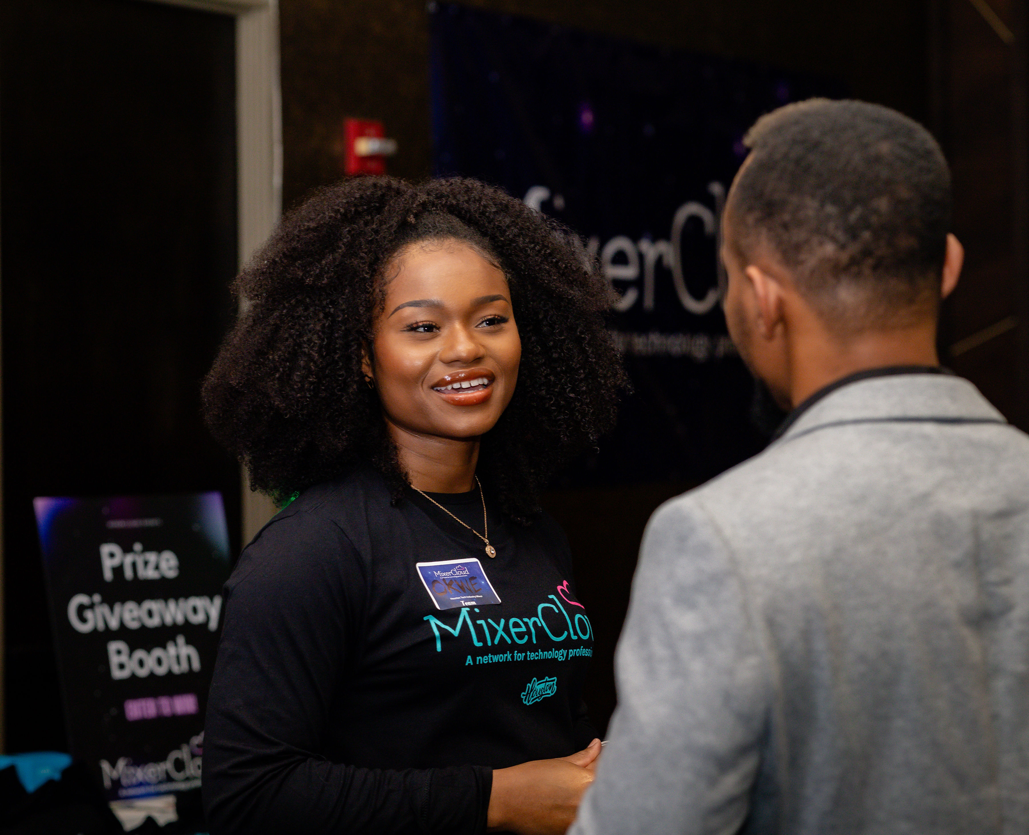 Professionals networking at a MixerCloud event