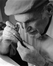 Henry Grossbard examining a diamond