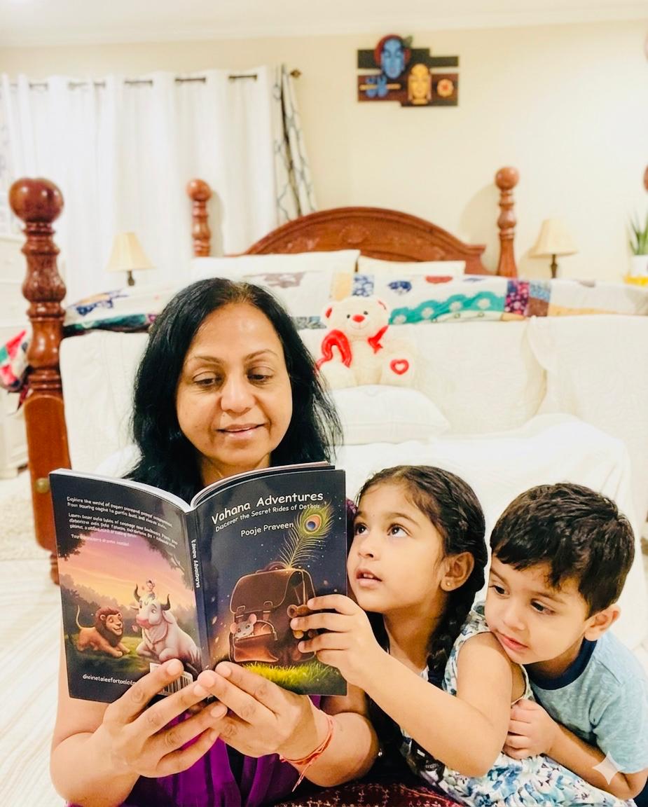 Sushma Srivastava reading Vahana Adventures to two children