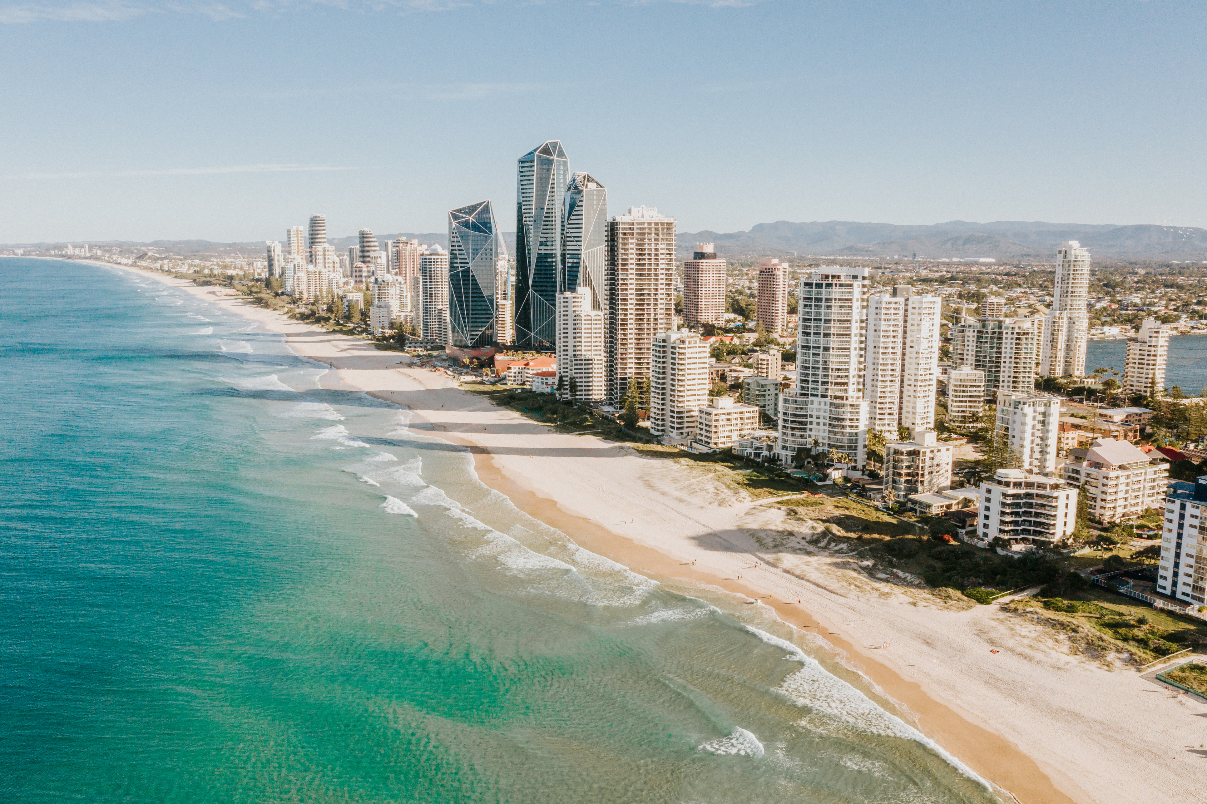 Coastal city skyline with beach