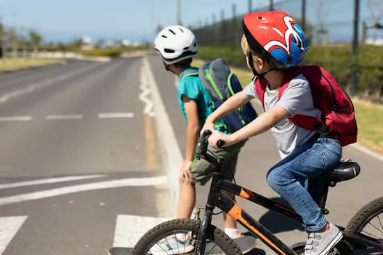 Kids cycling to school