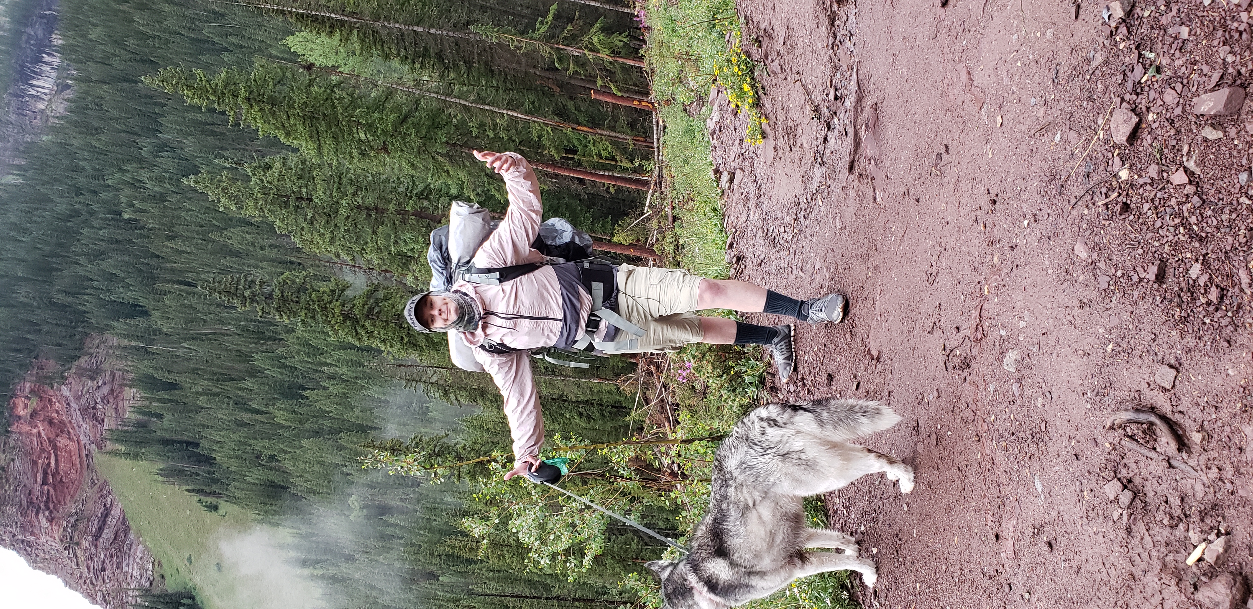 Robert hiking a Colorado trail with his dog