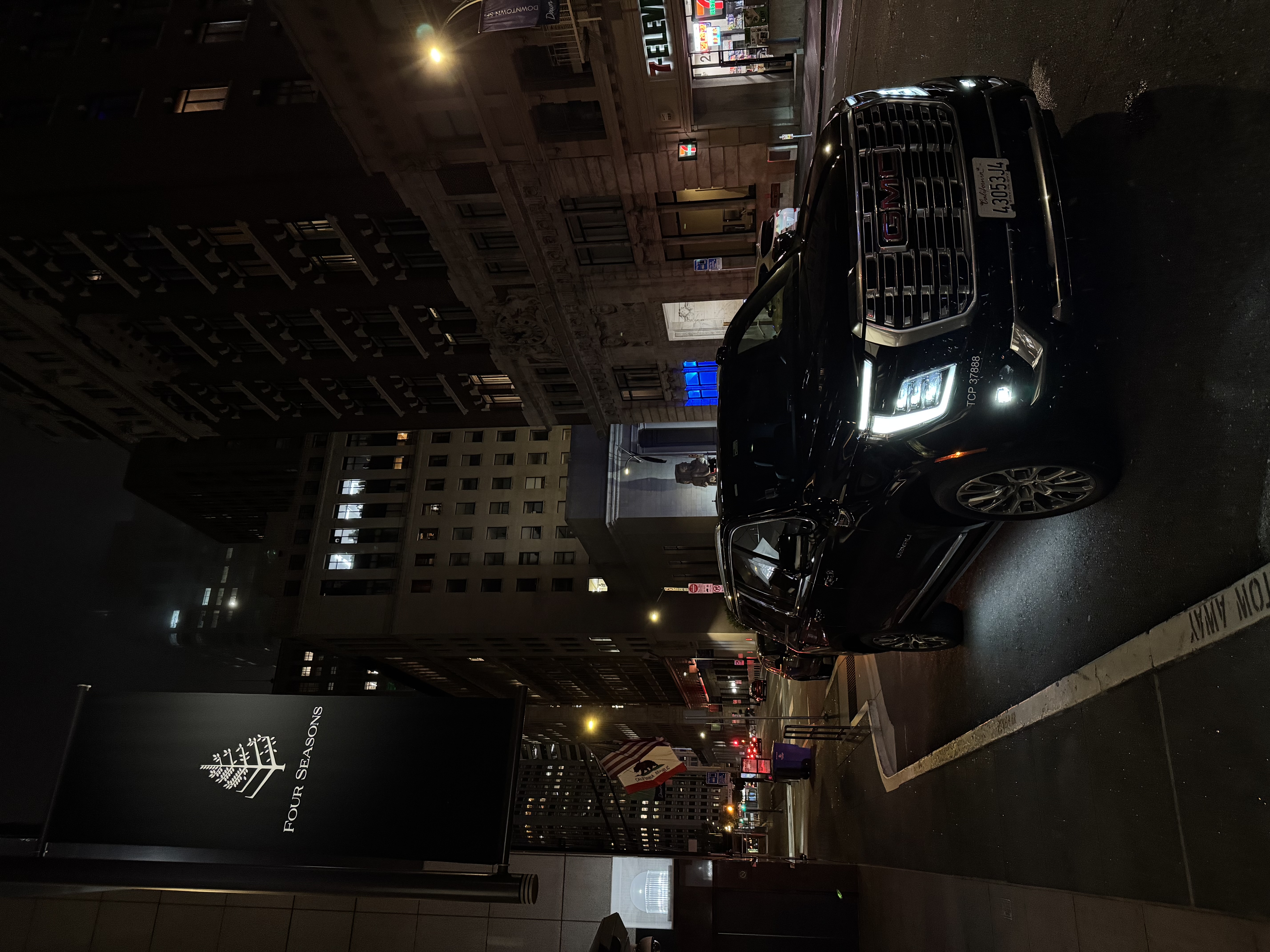 USA Limo GMC Denali at the Four Seasons at night