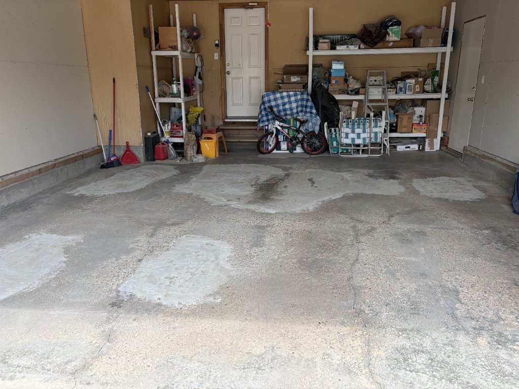 Garage floor concrete repair — MW Construction and Landscaping project 5 in Edmonton & Beaumont, Alberta