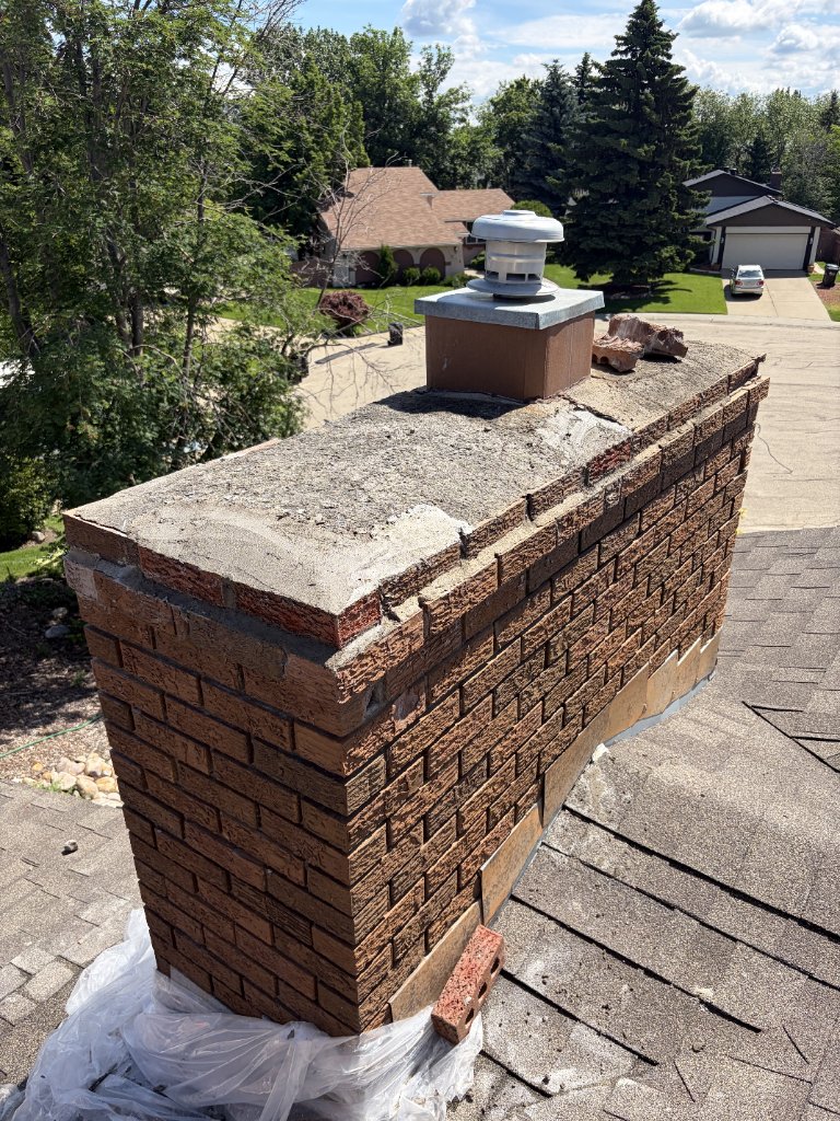 Modular Brick Repair/Replace — chimney brick restoration by MW Construction and Landscaping in Edmonton & Beaumont, Alberta