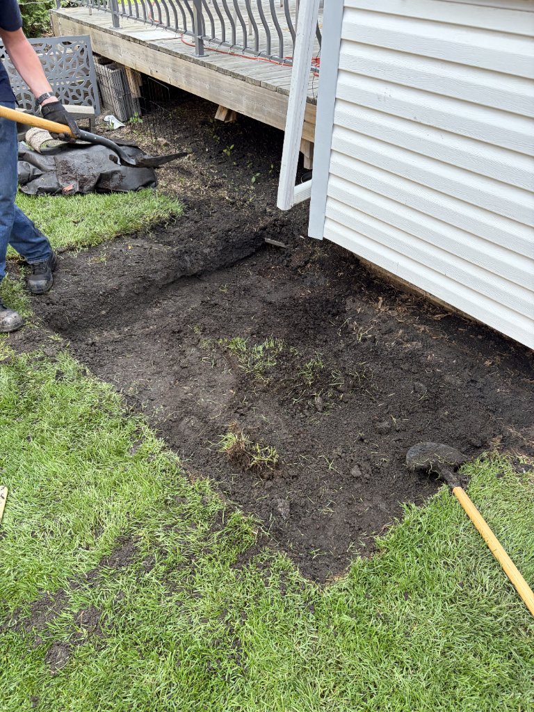 Backyard drainage project — Removal of grass and digging for drainage — MW Construction and Landscaping in Edmonton & Beaumont, Alberta