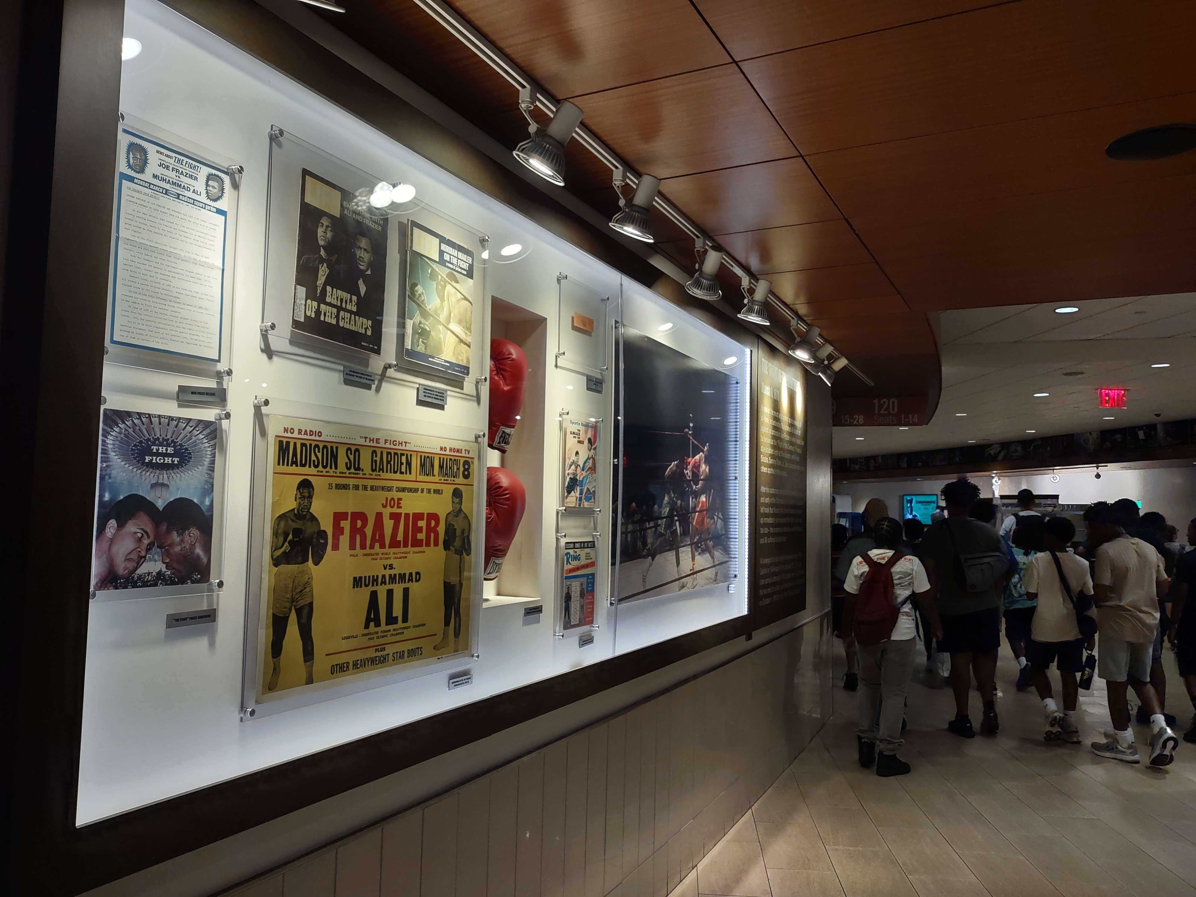 Display case of Muhammad Ali vs Joe Frazier Fight of the Century boxing memorabilia at Madison Square Garden