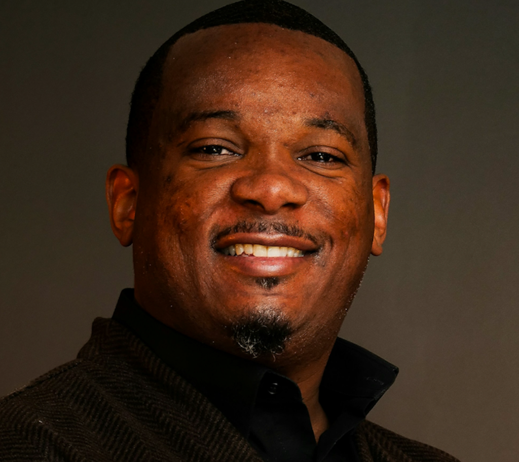 Portrait of a hip-hop contributor from Hip-Hop Magazine