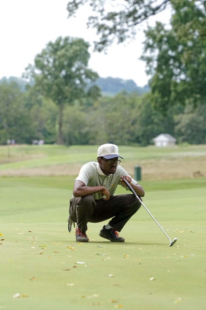 Member reading a putt