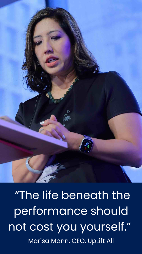Marisa Mann speaking on stage