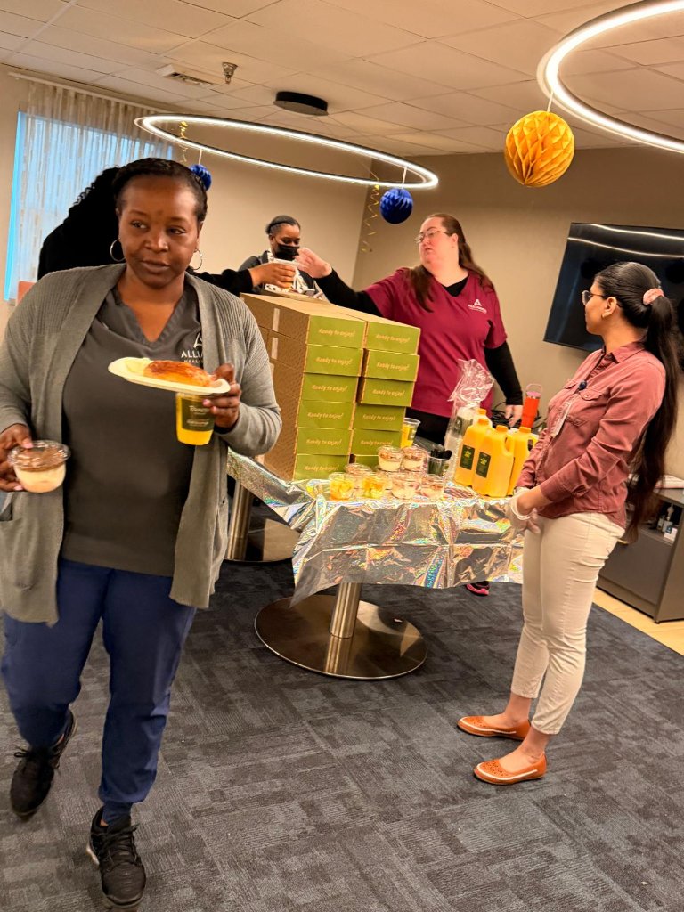 Employees enjoying food and drinks during appreciation week