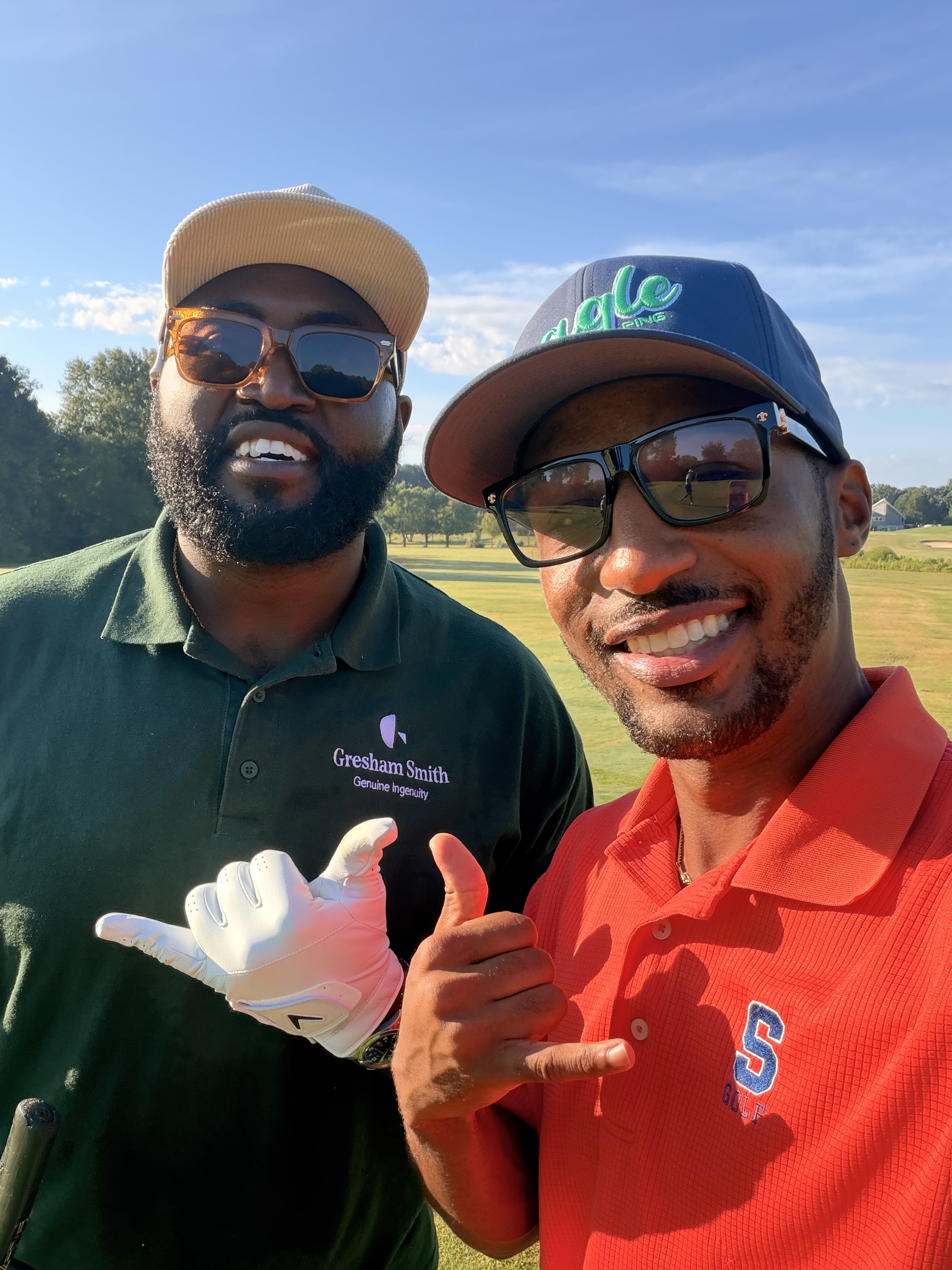 Two colleagues connecting on a golf course