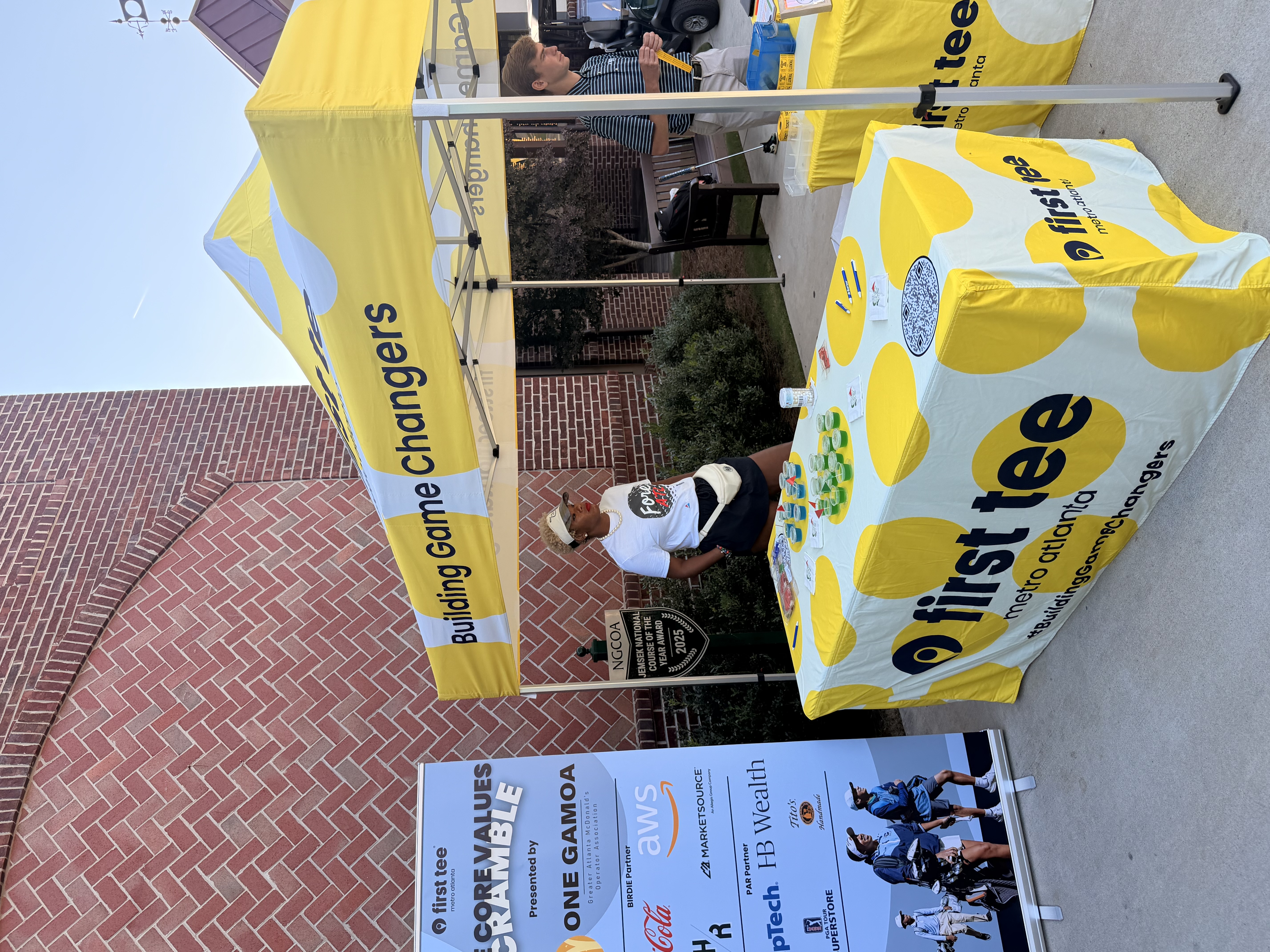 Youth community program event with tents and tables