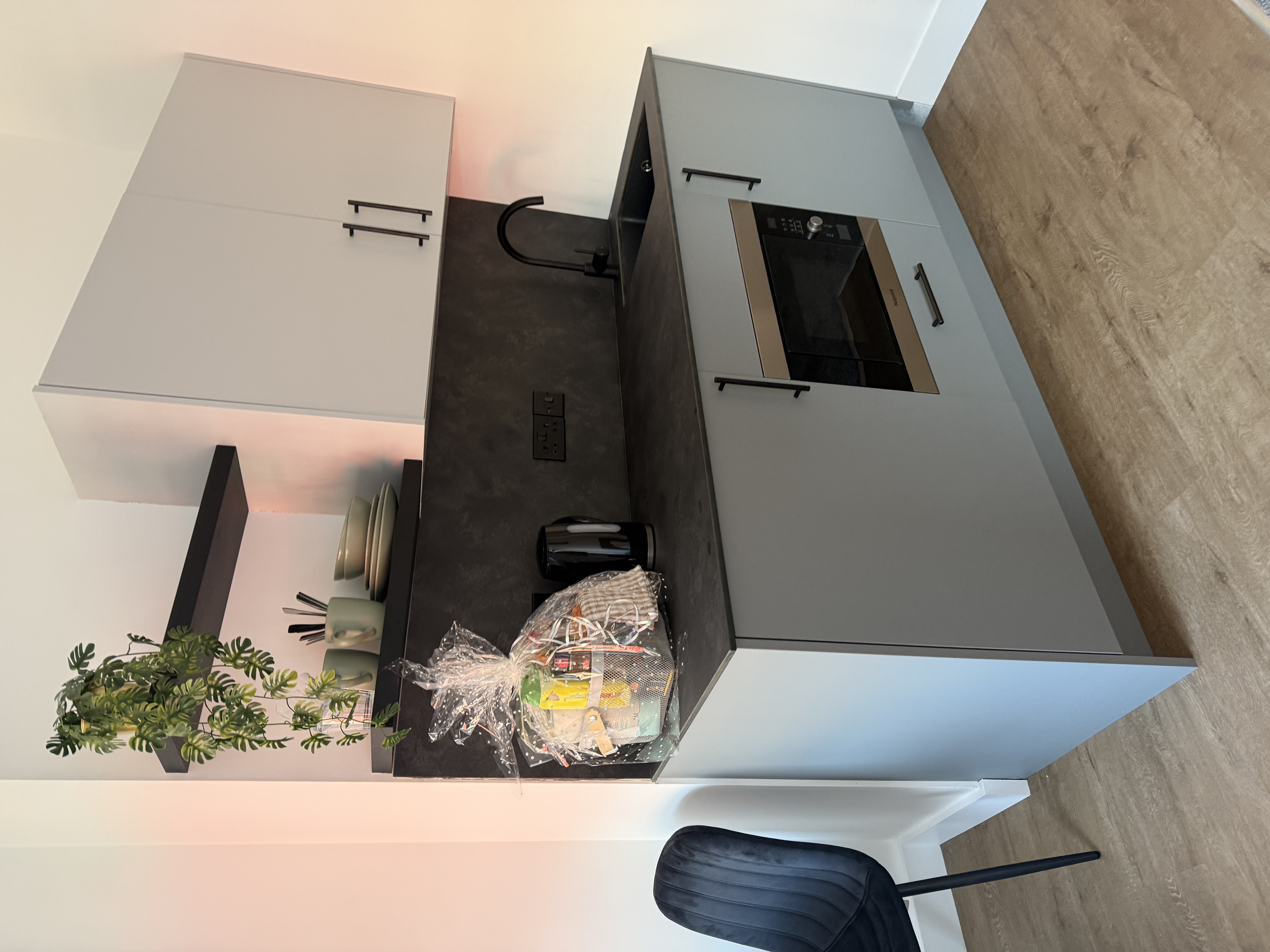 Kitchenette detail with integrated appliances