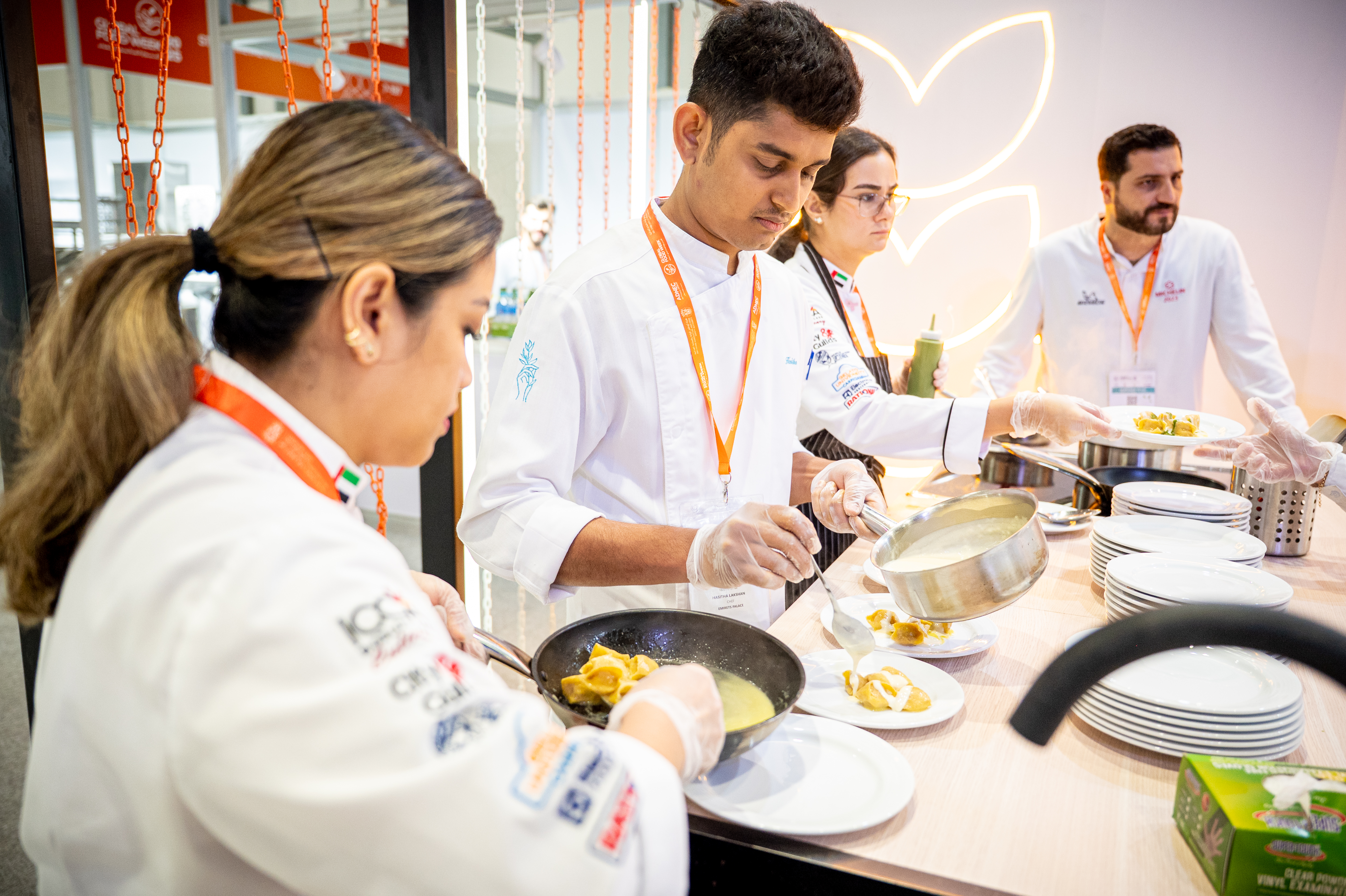 Chefs plating in the open kitchen