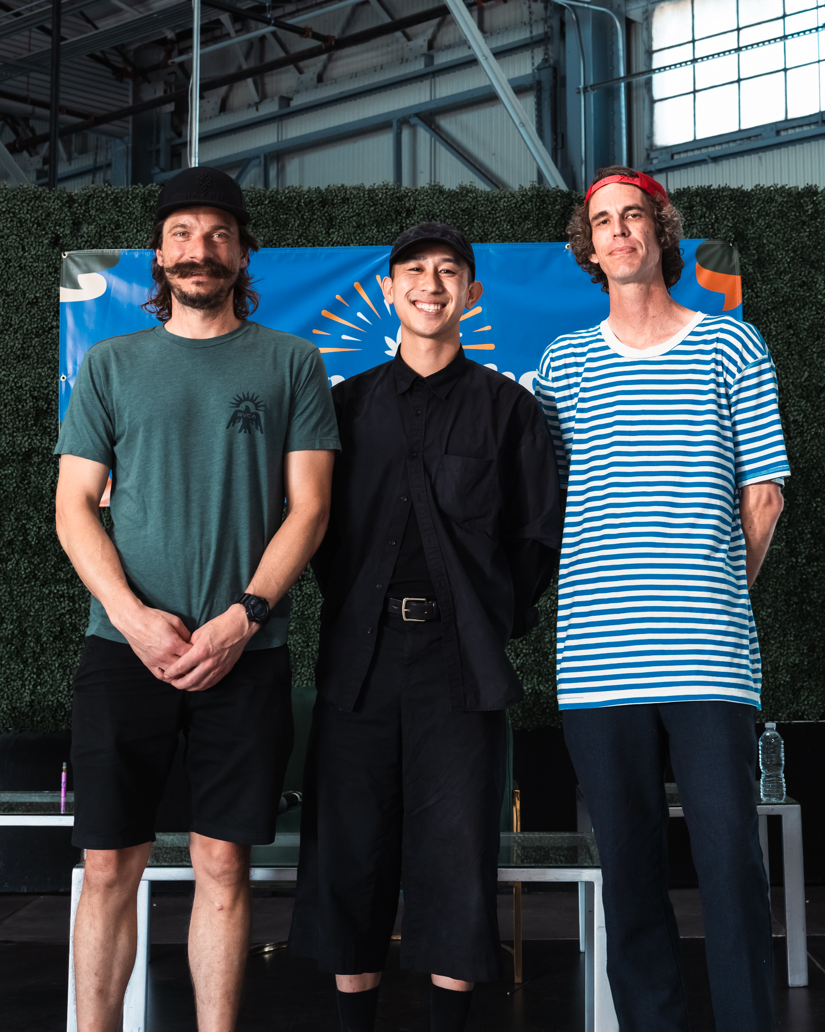 Three panel participants posing together at Network Show 2026