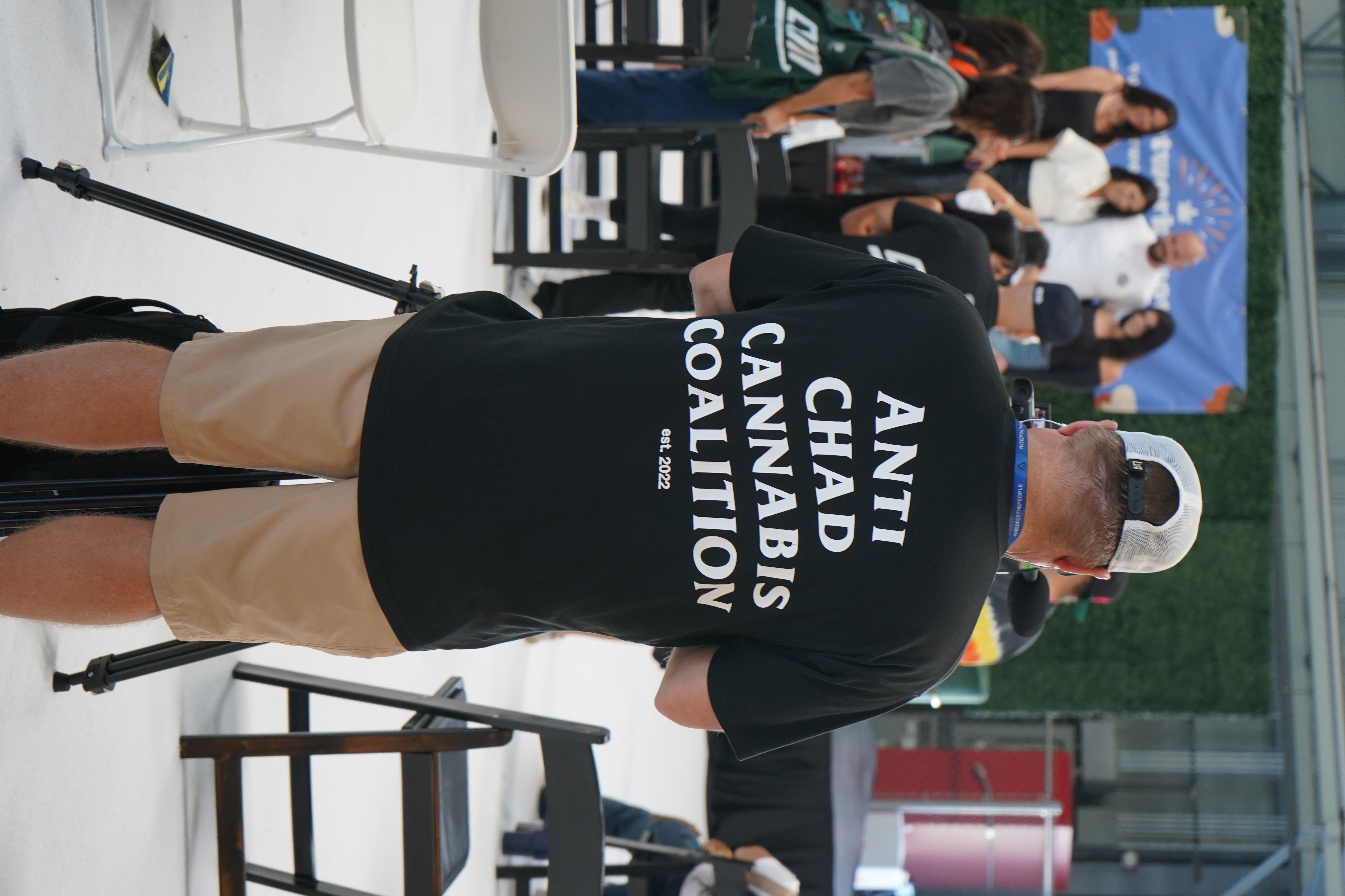 Camera operator filming near the Network Show stage