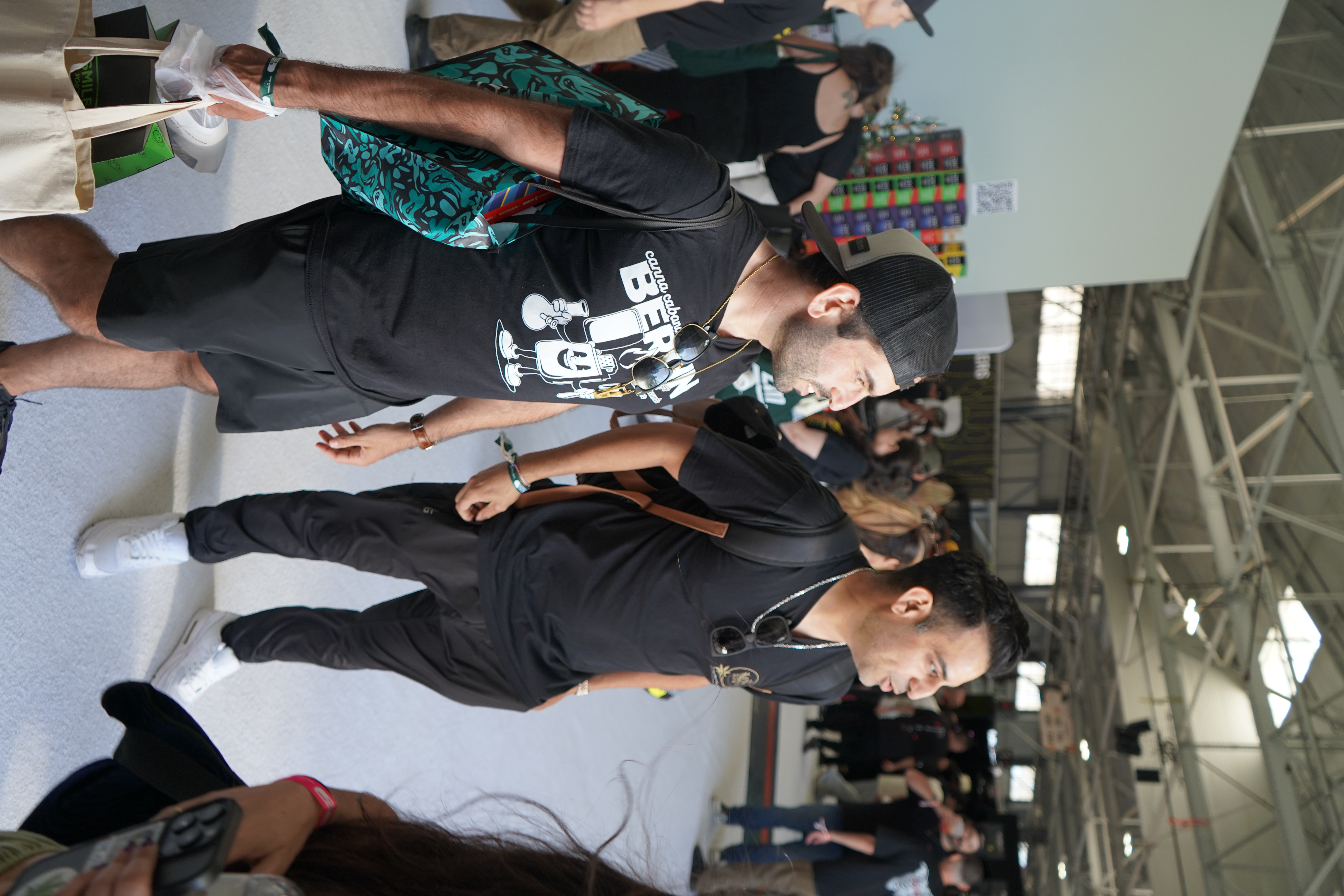 Two attendees walking through the Network Show venue
