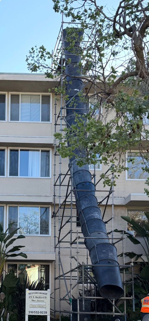 Trash Rocket TR-5000 debris conveyor rental at residential building