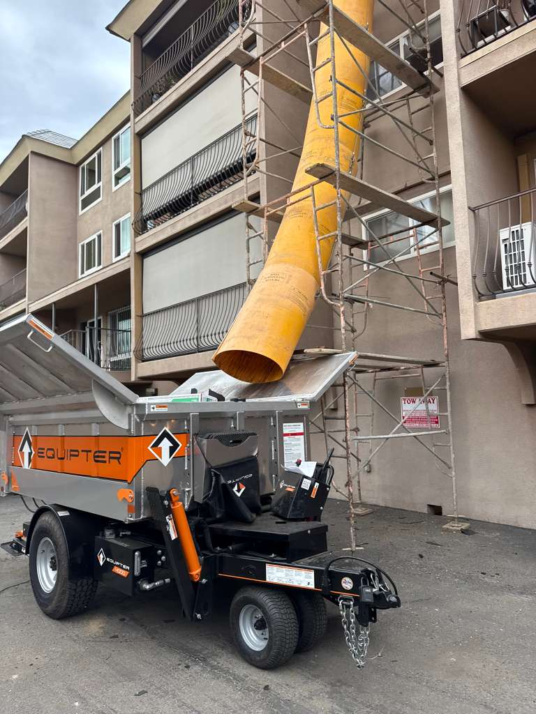 Custom chute for tight access