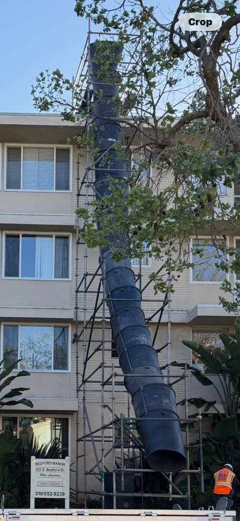 Trash chute scaffold building installation