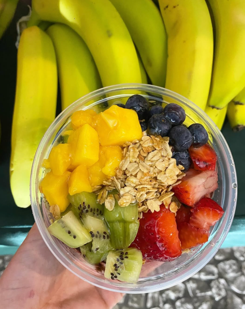 Açai bowl with granola, mango, kiwi & strawberries