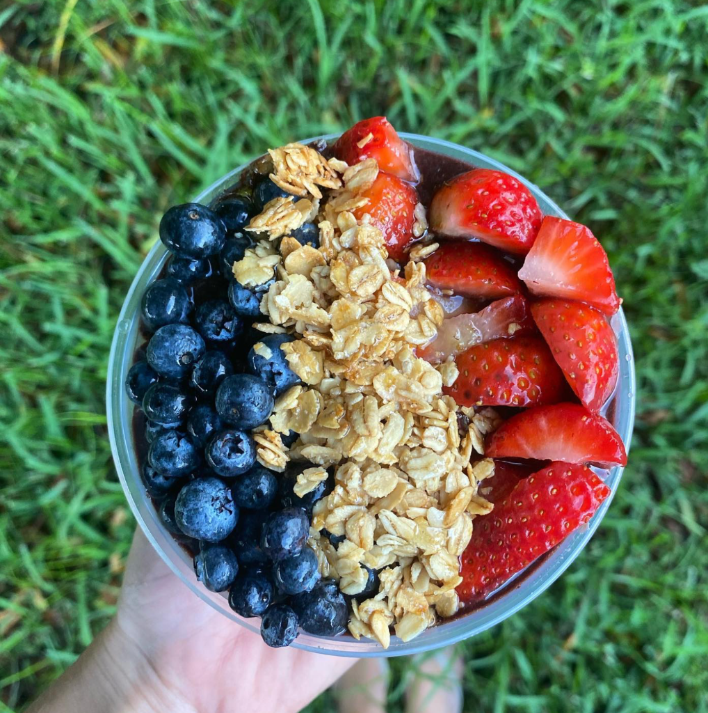 Açai bowl with granola, blueberries & strawberries
