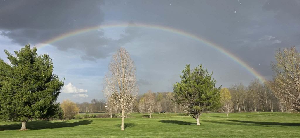 A stunning rainbow arches over the 7th hole at Iron Horse Golf Course — April 23, 2026 | 📷 Martha Swift