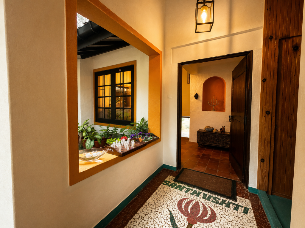 Mosaic-tiled entrance with Sarthushti design
