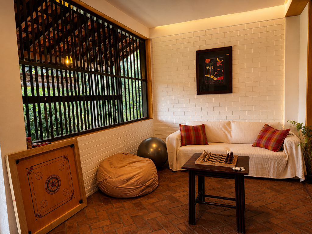 Geoffrey Bawa designed villa veranda at Forest Family Retreat with tropical garden views