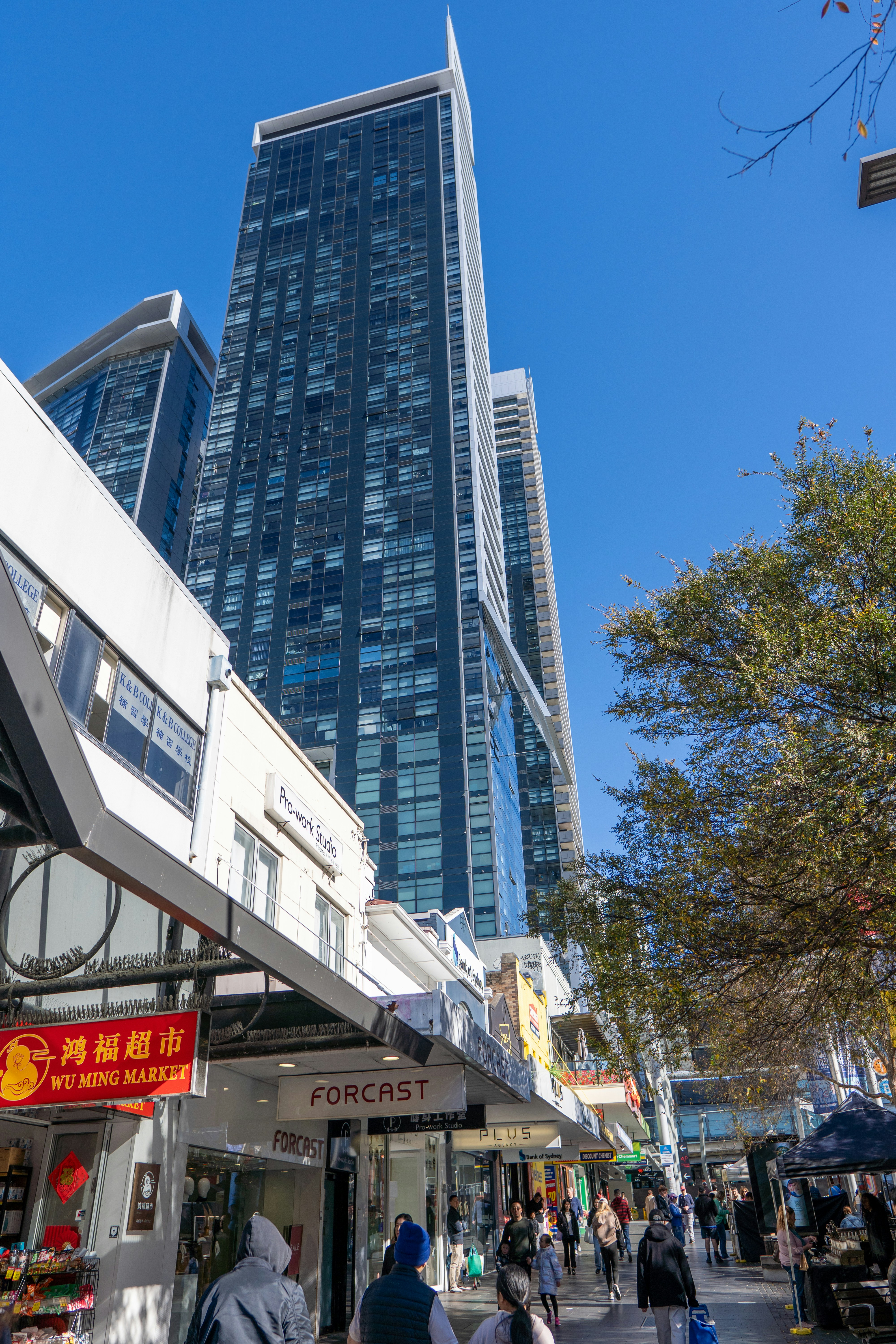 Chatswood tutoring: Street-level shopfronts beneath the high-rise towers of Chatswood on Sydney's North Shore