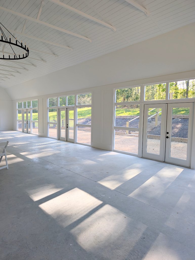 Sunlight pours into our barn—bright, airy, and ready for your celebration.