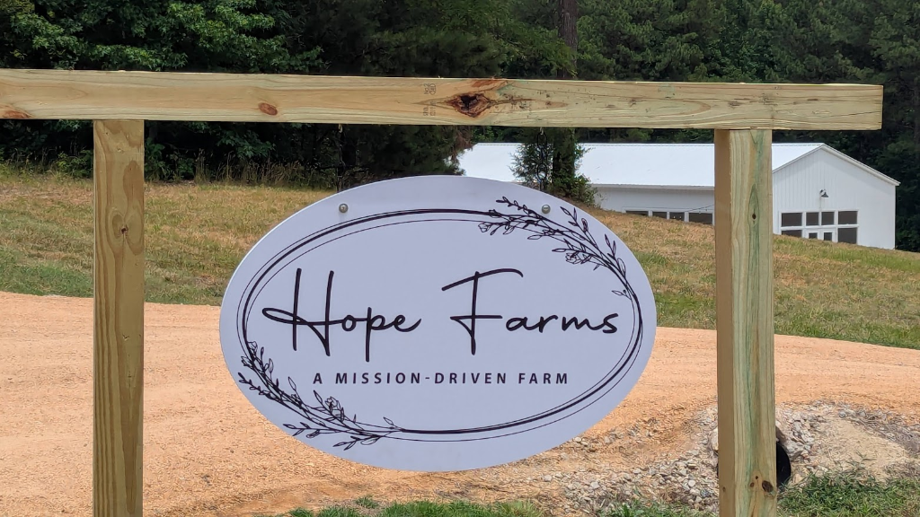 Hope Farms welcome sign at the entrance