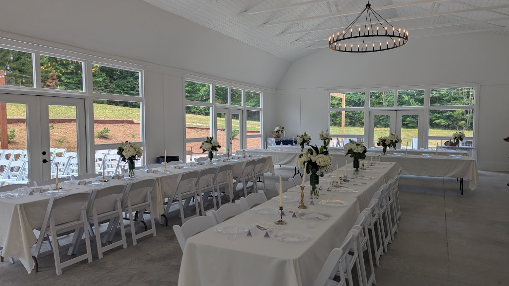 Bright barn interior set for an elegant reception