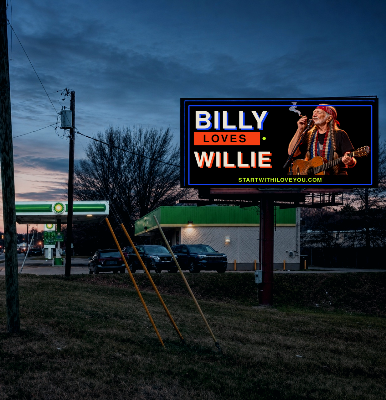 Billy Loves Willie billboard at dusk