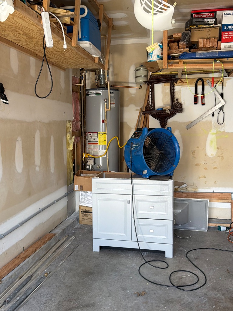 Industrial air mover — garage drying after water damage
