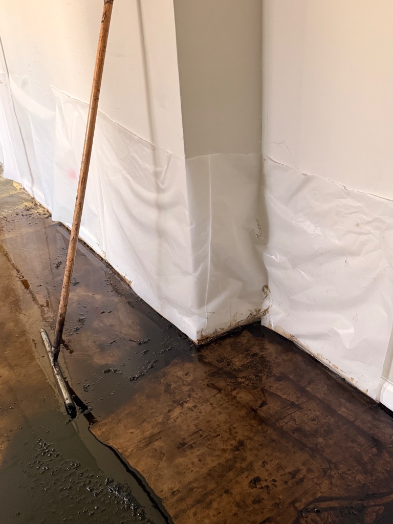Asbestos mastic removal — wet method with containment barrier