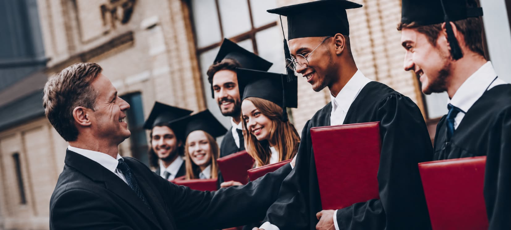 Graduation ceremony - students receiving diplomas