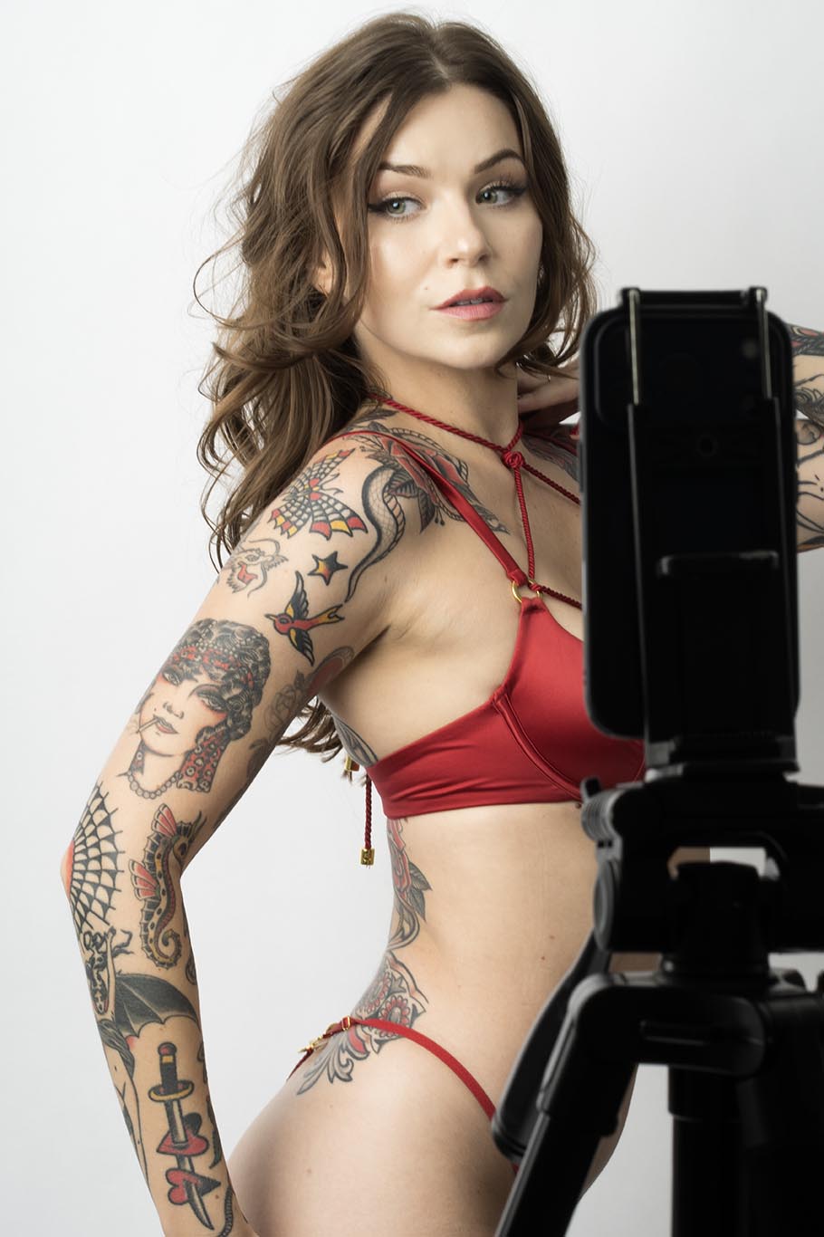 A person preparing to pose for a photo