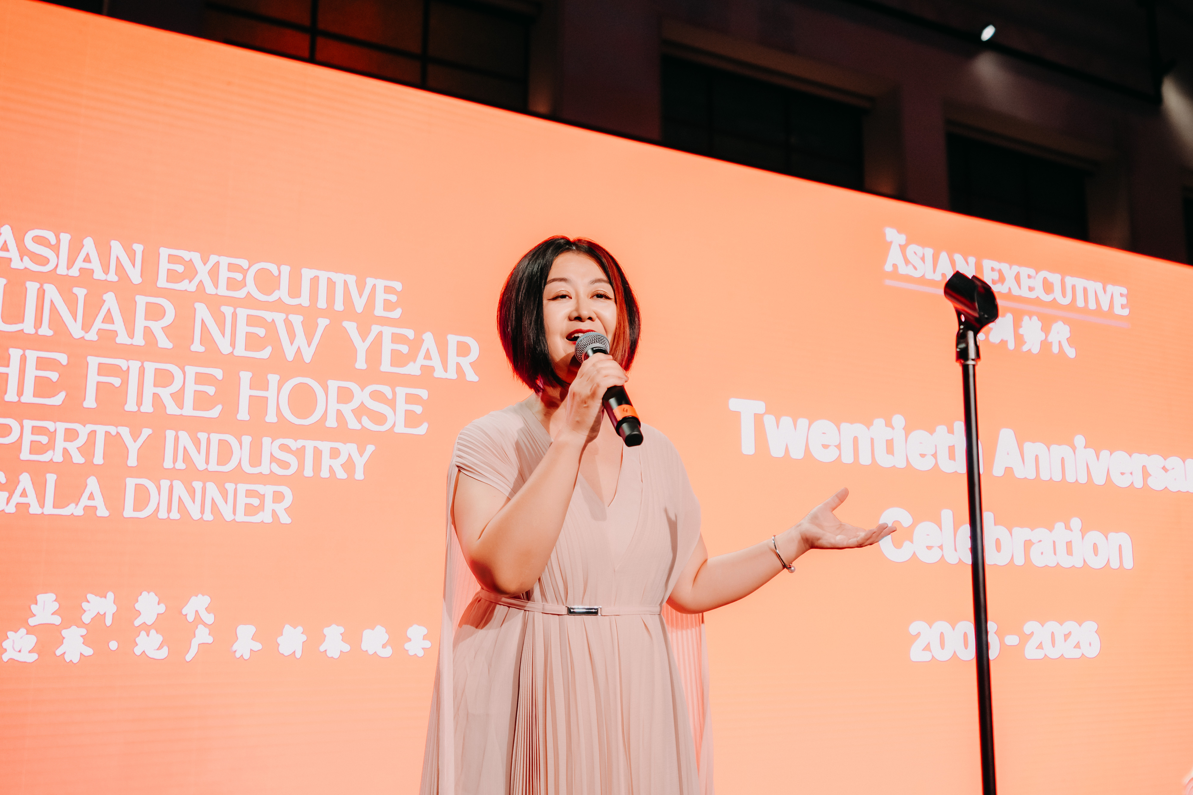 A guest speaker addressing attendees at the 2026 Lunar New Year Gala