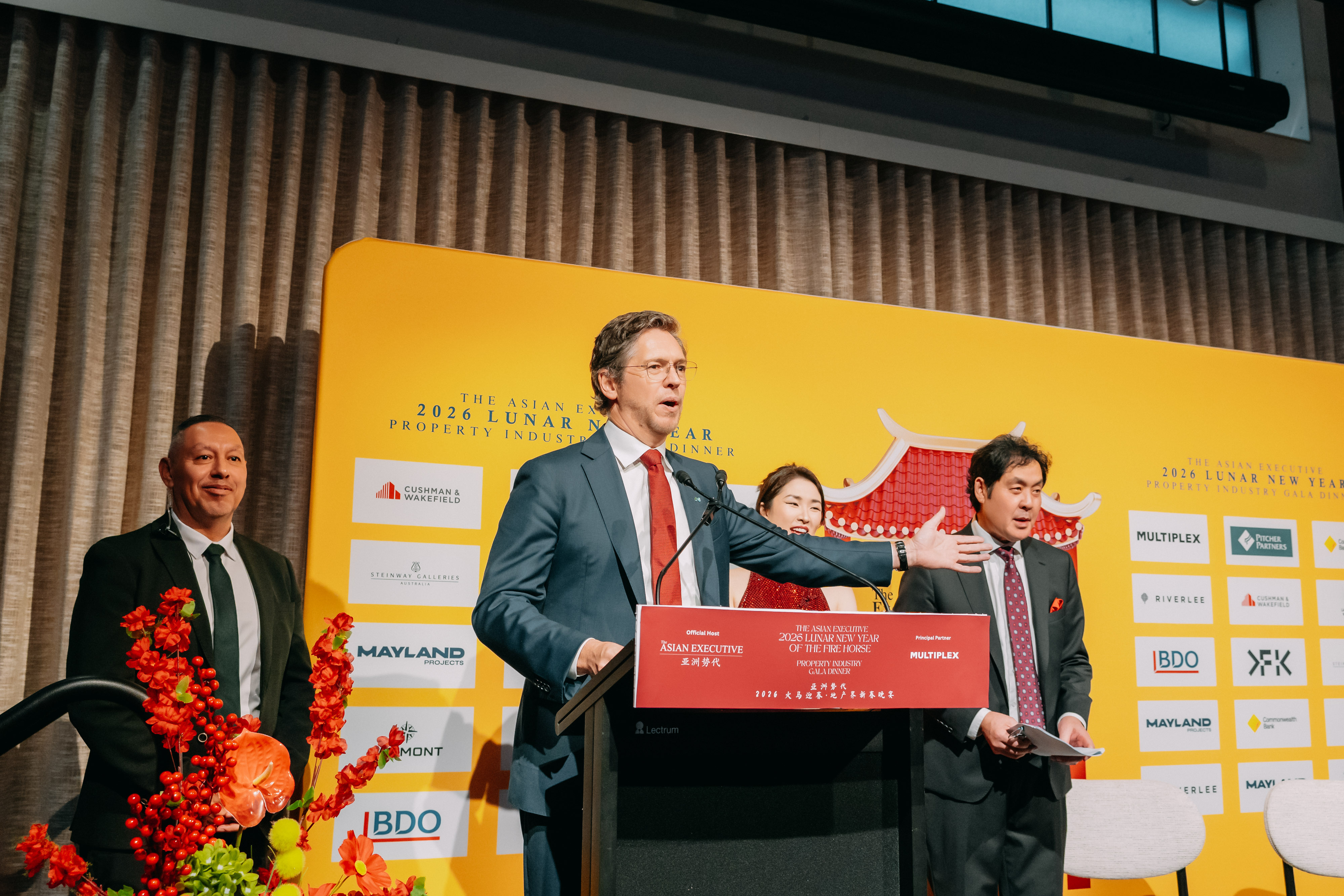 Speaker at the official podium during the 2026 Lunar New Year Gala