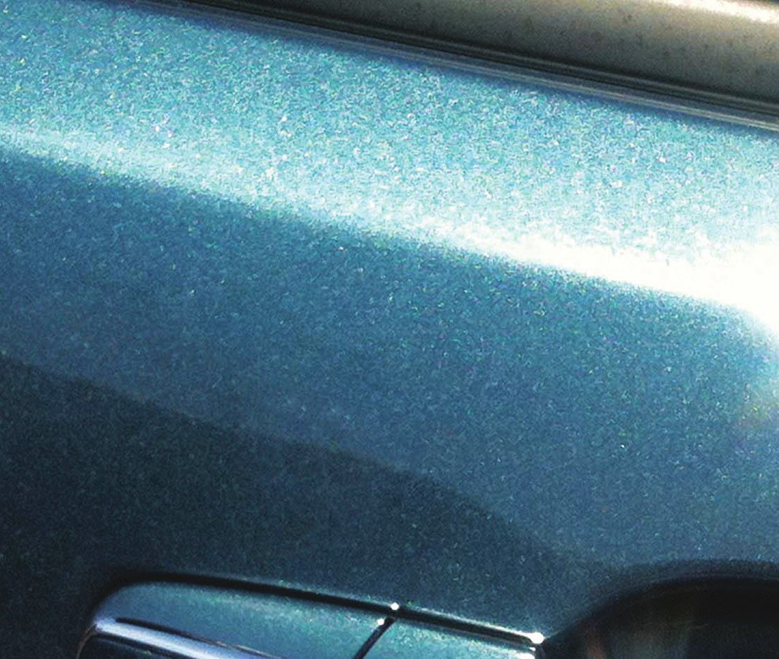 Vehicle panel after repair, scratches removed
