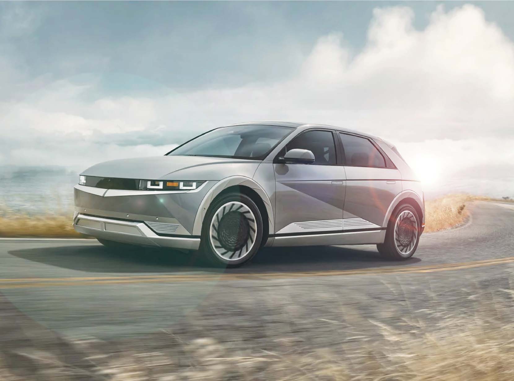 Electric car on a coastal road