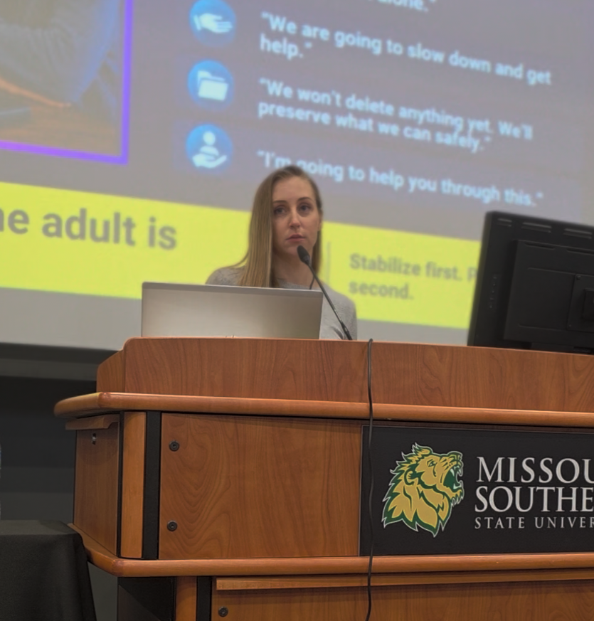 Stephanie delivering a training presentation