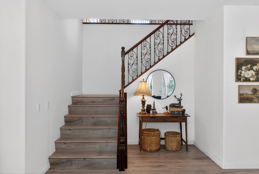 Elegant staircase with wrought iron railings