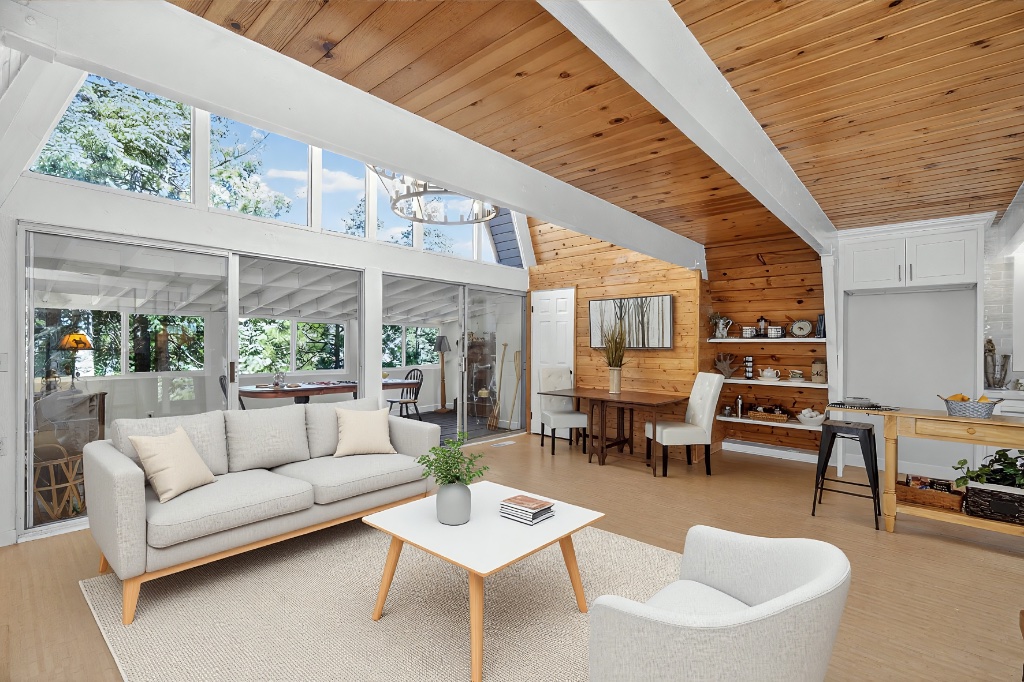 Open living and dining area with floor-to-ceiling windows
