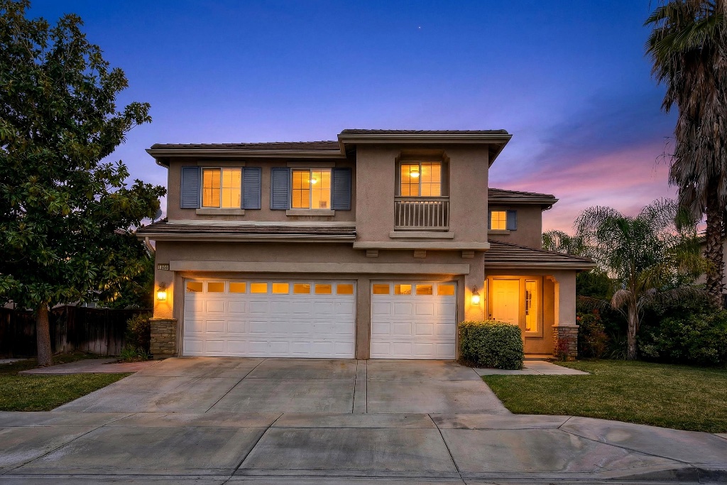 Two-story home twilight front exterior