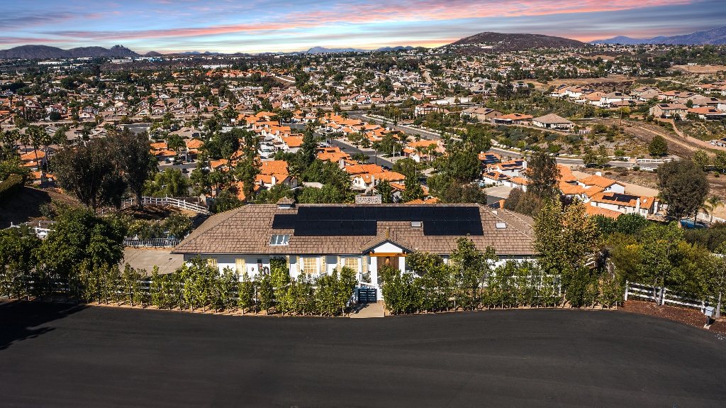 Aerial view of large estate with solar panels